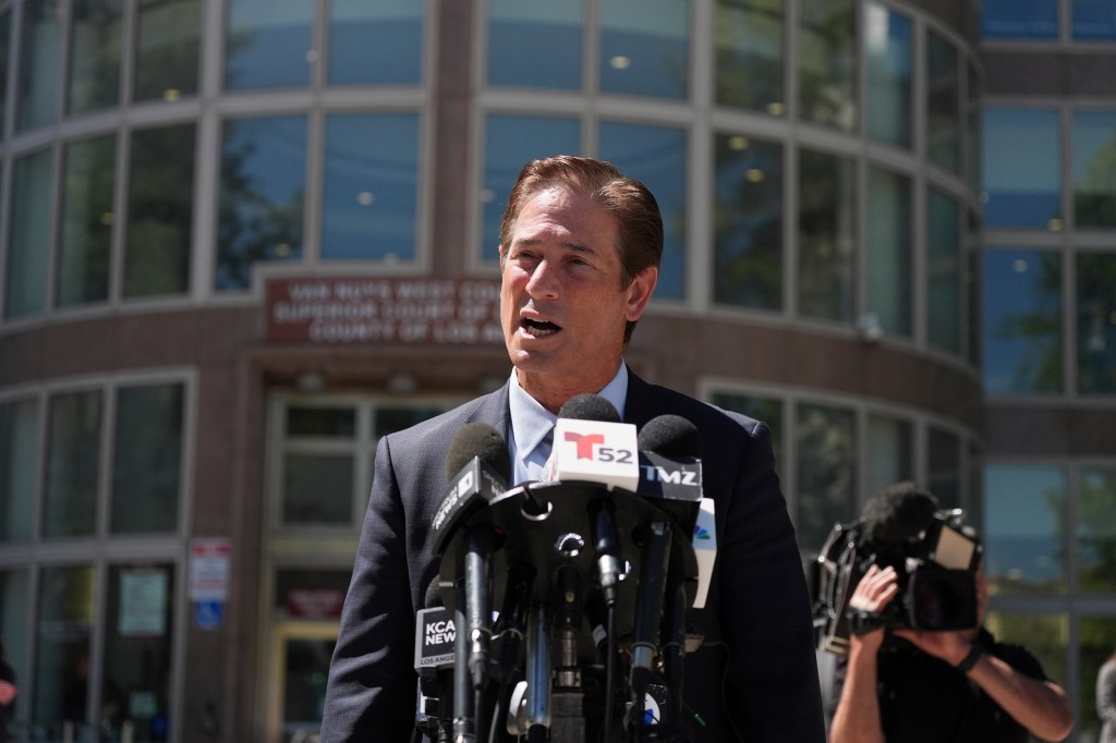 Los Angeles County District Attorney Nathan Hochman speaks to reporters outside the courthouse.