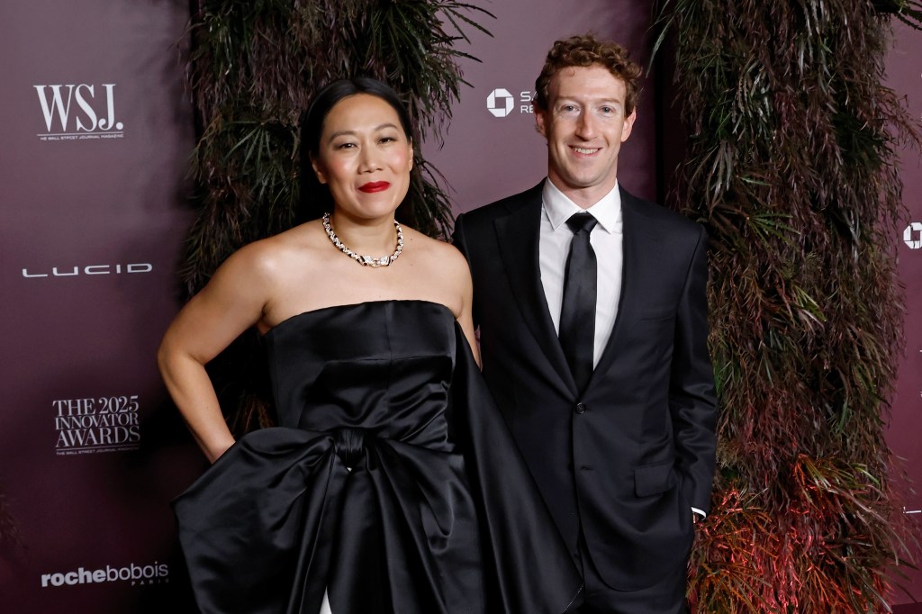 Priscilla Chan and Mark Zuckerberg smiling for a photo at the 2025 WSJ Magazine Innovator Awards.
