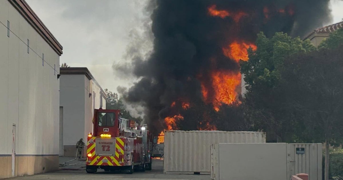Riverside firefighter injured battling pallet fire behind commercial building