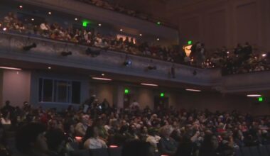 Football fans pack Oakland's Henry J. Kaiser Center for the Arts to watch Super Bowl