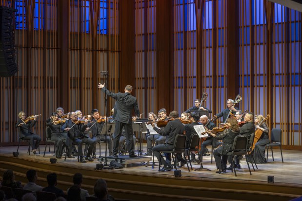 Mainly Mozart Music Director Michael Francis leads an All-Star Orchestra Festival concert at the Baker-Baum Concert Hall in La Jolla in 2024. (J. Kat Photo)