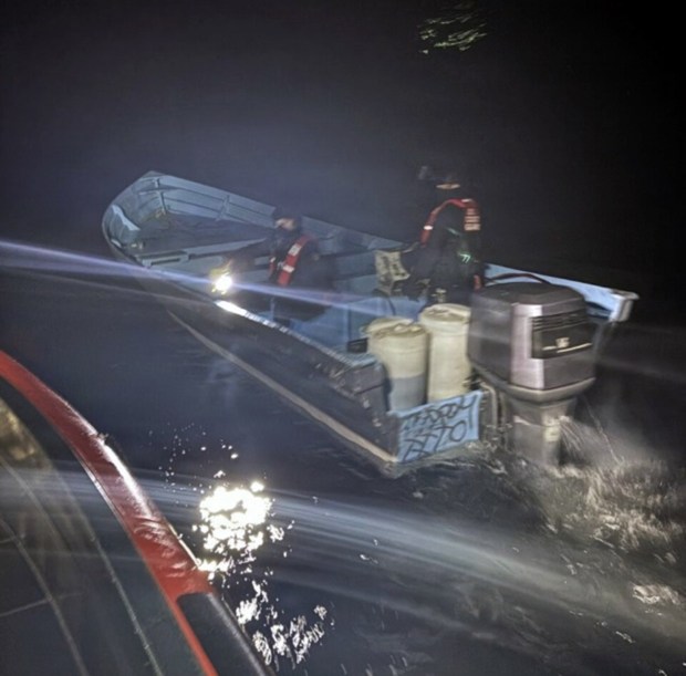 A Coast Guard Cutter Forrest Rednour (WPC 1129) boarding team interdicts a suspected alien smuggling vessel on Feb. 22, 2026, approximately 8 miles west of Sunset Cliffs, Calif. The crew discovered 20 individuals aboard: 19 claiming Mexican nationality and 1 claiming Sudanese nationality. (U.S. Coast Guard courtesy photo)