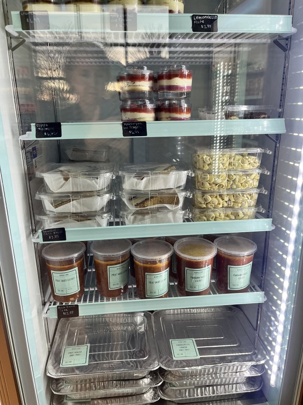 A grab-and-go chilling case with fresh-prepared pasta, sauces and desserts at Buon Cibo Italian Specialties, which opened Feb. 21 off Scripps Poway Parkway in San Diego. (Pam Kragen / The San Diego Union-Tribune)