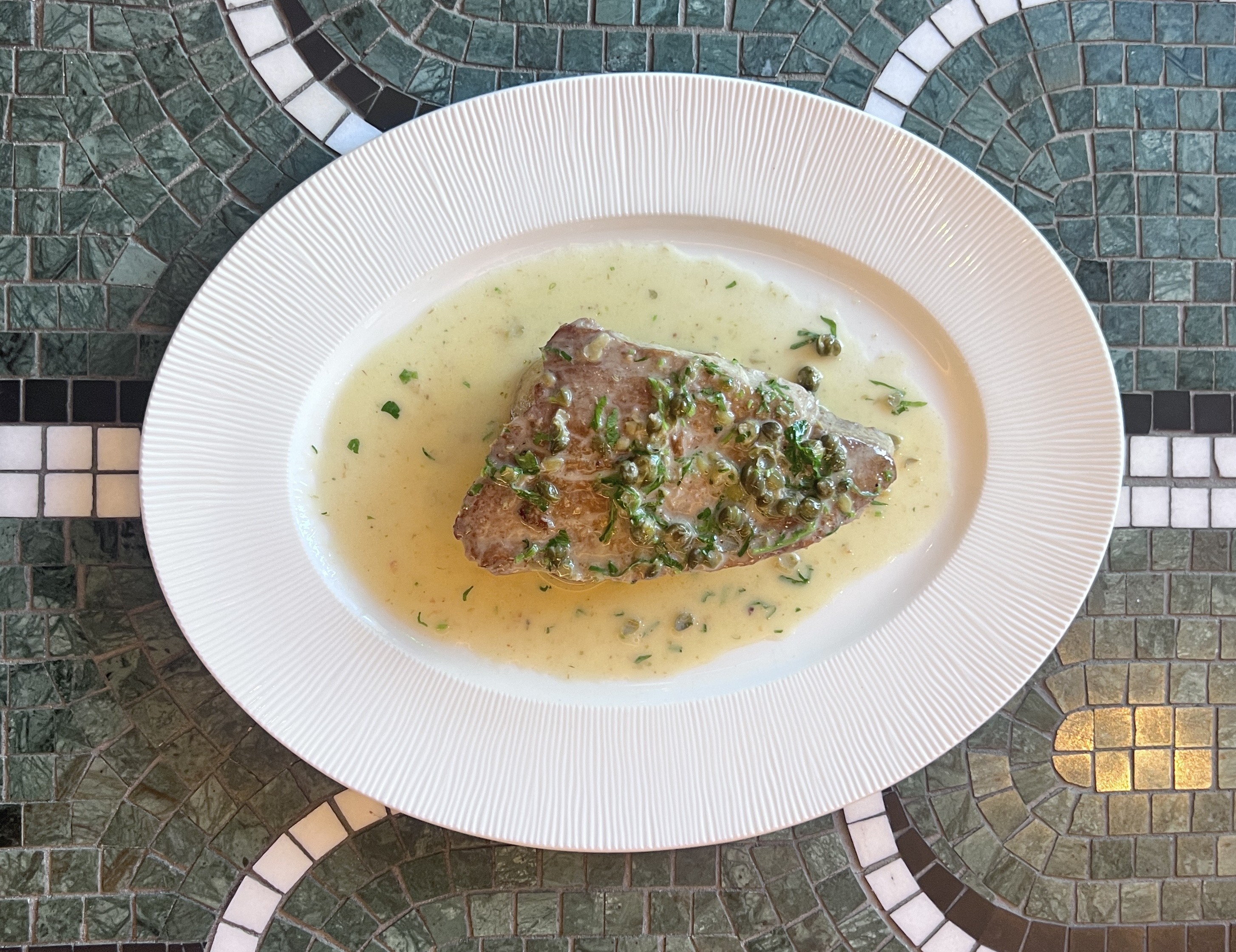 Local fish of the day prepared a la meunière, with...