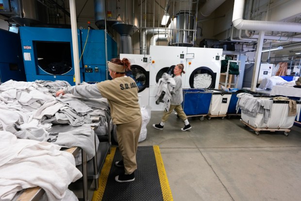 Women incarcerated at the Las Colinas Detention and Reentry Facility do laundry on Wednesday, Jan. 28, 2026. (Nelvin C. Cepeda / The San Diego Union-Tribune)