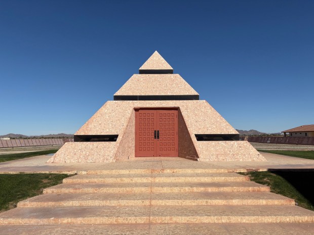 A granite-and-glass pyramid marks the "center of the world" in Felicity. Visitors can go inside and stand on the exact point. (Abby Hamblin / The San Diego Union-Tribune)