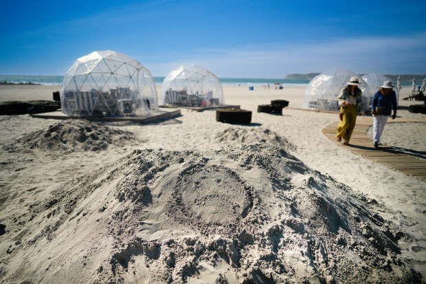 On one of the small sand mounds that once were sandcastles, a message was drawn, presumably for the abrupt departure of Bill Pavlacka, known by many as the Sandcastle Man. After nearly 19 years of creating sandcastles for hotel guests and beach visitors to admire, Pavlacka was asked on Feb. 5th to pack his tools and to leave the property.