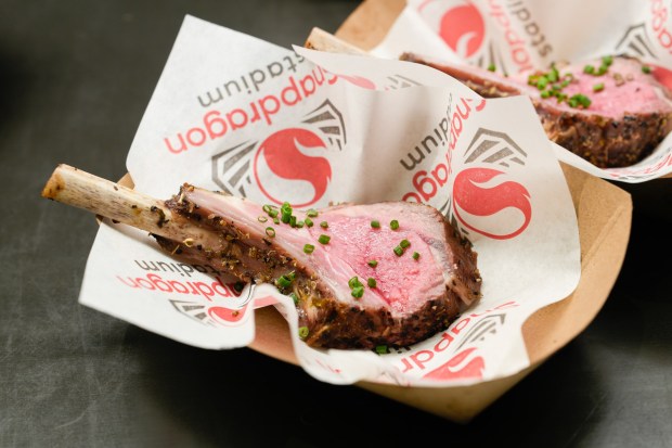 Chefs cooked Mini lamb chops in rosemary butter, were among the new items added to the menu at Snapdragon Stadium on Tuesday, Feb. 17, 2026, in San Diego.  (Nelvin C. Cepeda / The San Diego Union-Tribune)