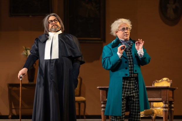 Craig Colclough as Don Basilio, left, and Patrick Carfizzi as Don Bartolo in San Diego Opera's "The Barber of Seville." (Karli Cadel)