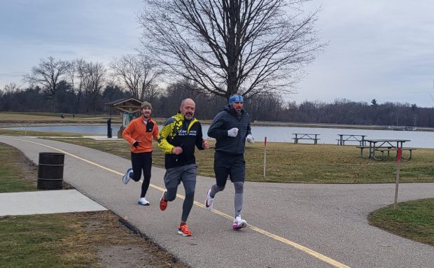 Members of the Infinite Multisport Triathlon Club gathered at Stony Creek Metropark on New Year's Eve morning fpr a run and social gathering.(PHOTO BY SUSAN SMILEY)