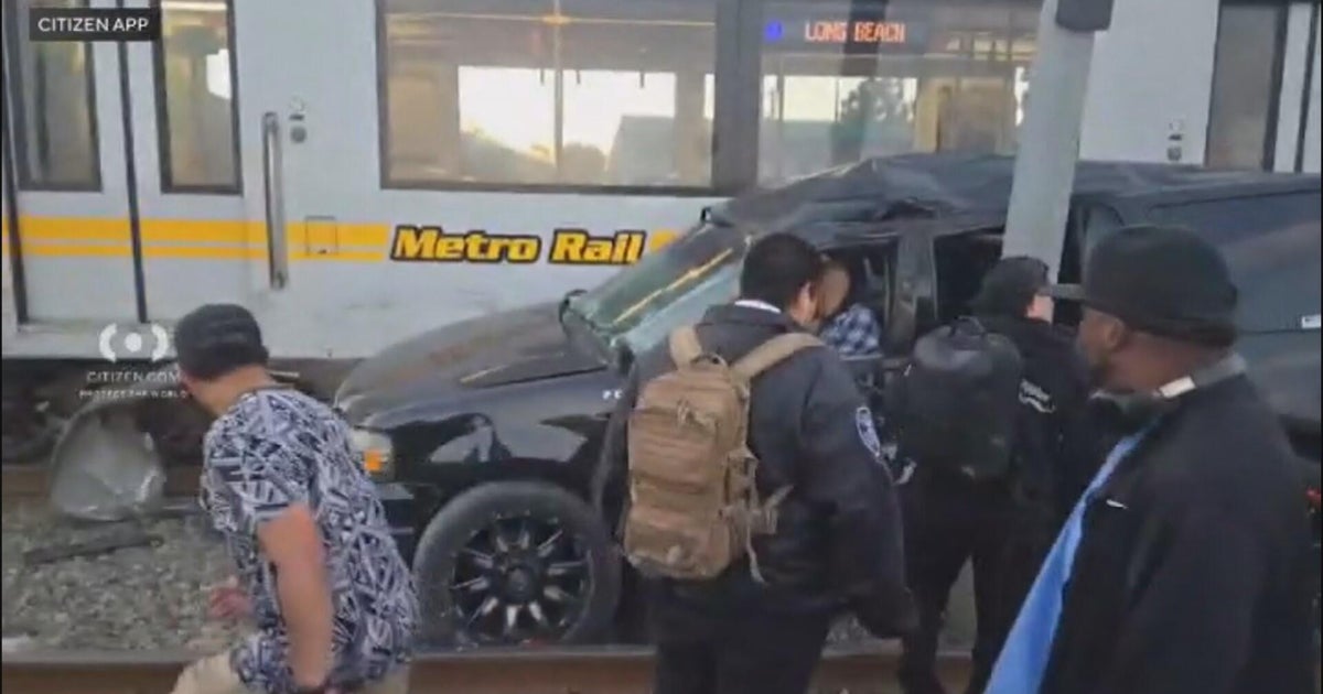 4 people hospitalized after Metro train collides with car in South Los Angeles