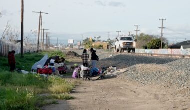 Police clear large railroad encampment, offer resources to displaced residents