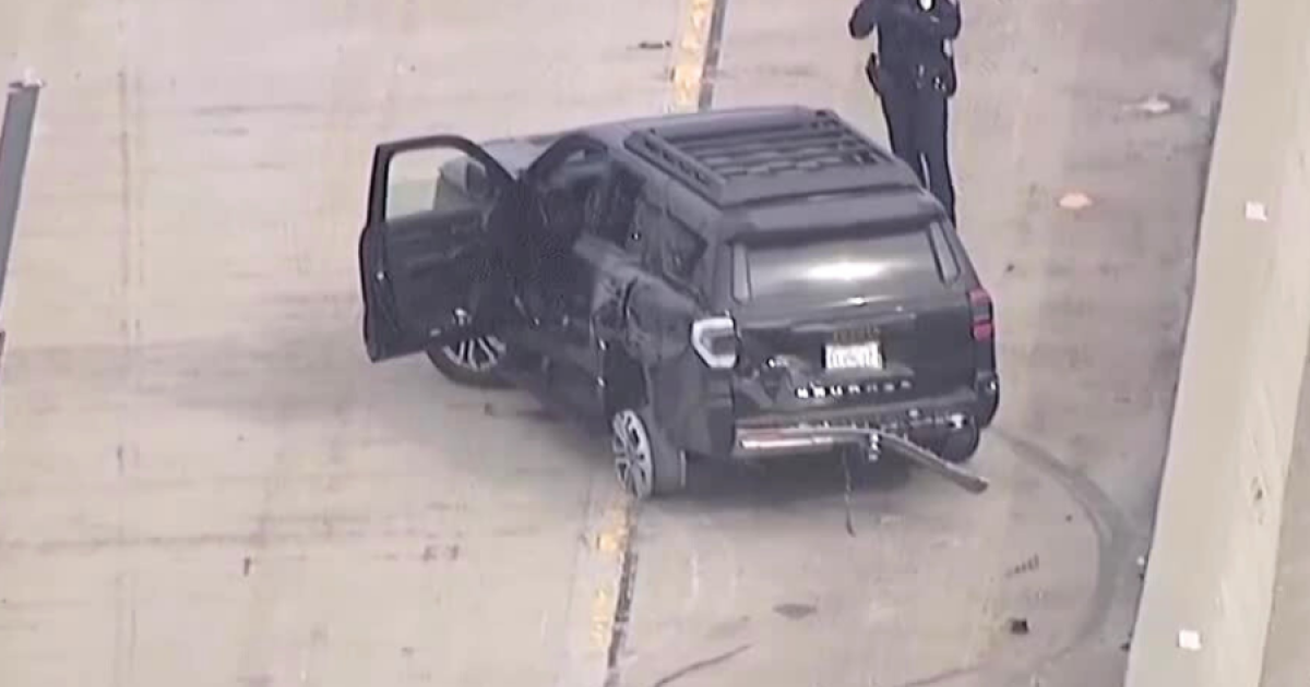 Woman suspected of stealing trailer taken into custody after wild pursuit