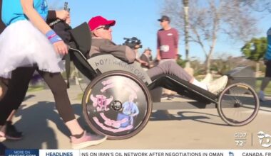 Man with terminal PSP completes 5K race with 55-person support team