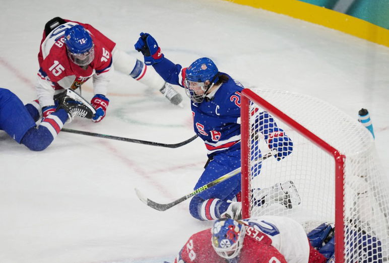 Feb 5, 2026; Milan, Italy; Hilary Knight (21) of Team United States celebrates after scoring a goal against Team Czechia 