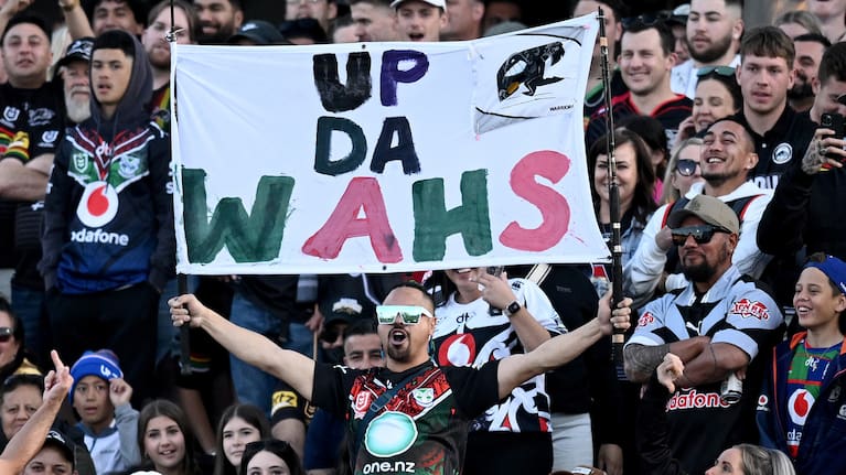 Warriors supporters at a Panthers, Warriors match up.