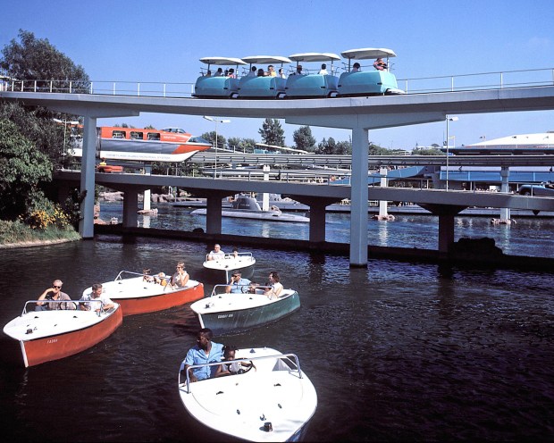 The PeopleMover, top, traverses over the Motor Boat Cruise and the Disneyland-Alweg Monorail in this historic photo. (Photo courtesy of the Disneyland Resort)