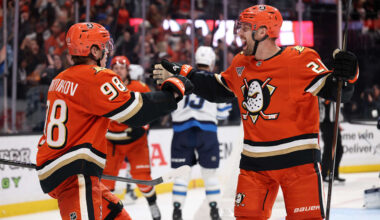Feb 27, 2026; Anaheim, California, USA;  Anaheim Ducks defenseman Pavel Mintyukov (98) celebrates with left wing Jeffrey Viel (28) after scoring a goal during the third period against the Winnipeg Jets at Honda Center. Mandatory Credit: Kiyoshi Mio-Imagn Images