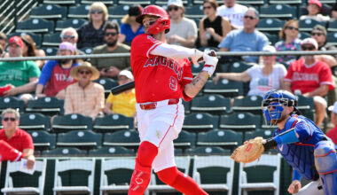 Feb 23, 2026; Tempe, Arizona, USA;  Los Angeles Angels shortstop Zach Neto (9) singles in the first inning against the Texas Rangers during a spring training game at Tempe Diablo Stadium. Mandatory Credit: Matt Kartozian-Imagn Images
