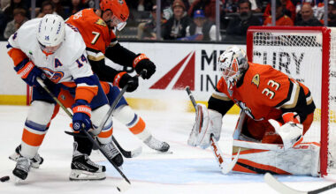 Mar 4, 2026; Anaheim, California, USA;  Anaheim Ducks goaltender Ville Husso (33) defends the goal as New York Islanders center Bo Horvat (14) and Anaheim Ducks defenseman Radko Gudas (7) fight for the puck during the third period at Honda Center. Mandatory Credit: Kiyoshi Mio-Imagn Images