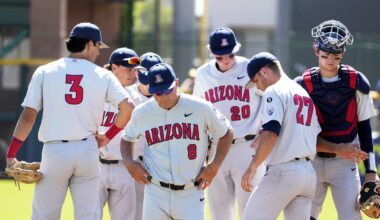 May 25, 2022; Scottsdale, Arizona, USA; Arizona Wildcats head coach Chip Hale (8) returns to the dugout after a meeting with pitcher Dawson Netz (27) against the Oregon Ducks in the third inning during the Pac-12 Baseball Tournament at Scottsdale Stadium. NCAA Baseball Arizona At Oregon