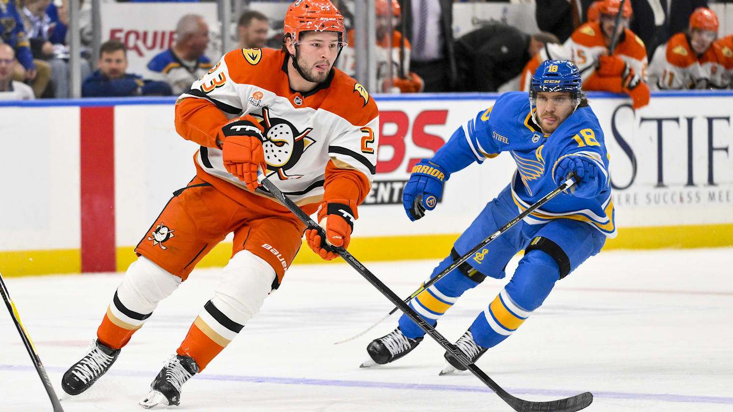 Dec 1, 2025; St. Louis, Missouri, USA; Anaheim Ducks center Mason McTavish (23) controls the puck against the St. Louis Blues during the third period at Enterprise Center. Mandatory Credit: Jeff Curry-Imagn Images