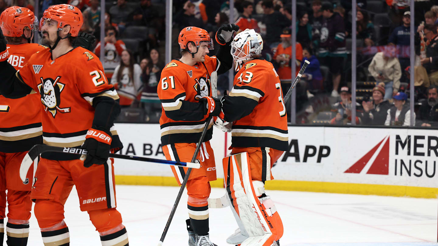 Mar 4, 2026; Anaheim, California, USA;  Anaheim Ducks left wing Cutter Gauthier (61) celebrates with goaltender Ville Husso (33) after defeating the New York Islanders 5-1 at Honda Center. Mandatory Credit: Kiyoshi Mio-Imagn Images