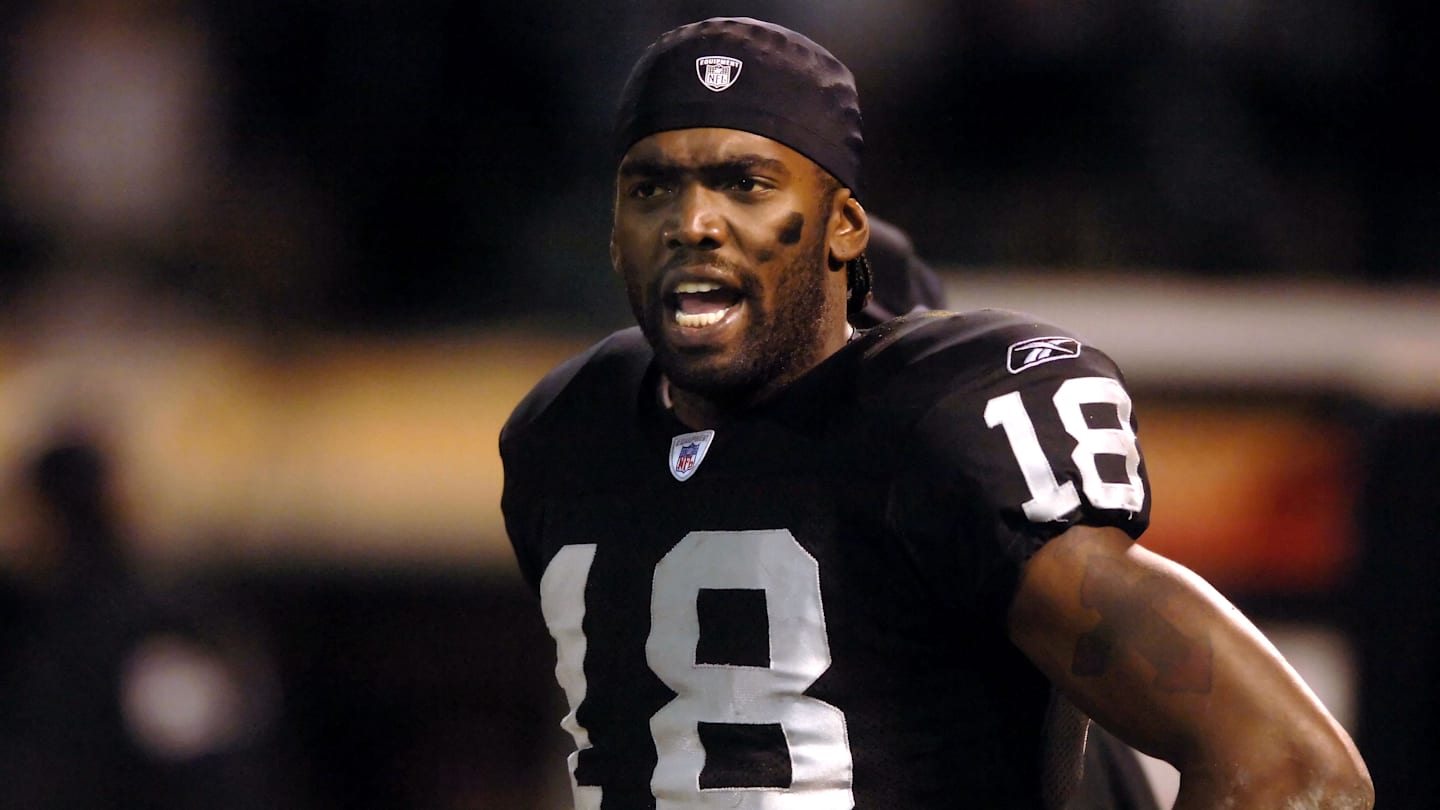 Dec. 31, 2005; Oakland, Calif, USA; Oakland Raiders wide receiver (18) Randy Moss expresses his displeasure with head coach Norv Turner (not pictured) during their game against the New York Giants in the fourth quarter at McAfee Coliseum. Mandatory Credit: Photo By Mark J. Rebilas-Imagn Images © Copyright Mark J. Rebilas