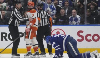 Mar 12, 2026; Toronto, Ontario, CAN; Anaheim Ducks defenseman Radko Gudas (7) looks at an injured Toronto Maple Leafs forward Auston Matthews (34) after he delivered a knee on knee hit during the second period at Scotiabank Arena. Mandatory Credit: John E. Sokolowski-Imagn Images