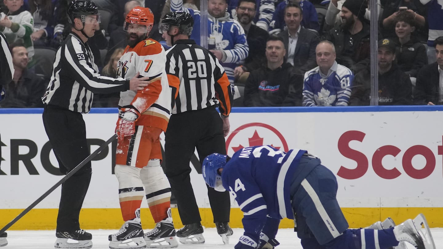 Mar 12, 2026; Toronto, Ontario, CAN; Anaheim Ducks defenseman Radko Gudas (7) looks at an injured Toronto Maple Leafs forward Auston Matthews (34) after he delivered a knee on knee hit during the second period at Scotiabank Arena. Mandatory Credit: John E. Sokolowski-Imagn Images