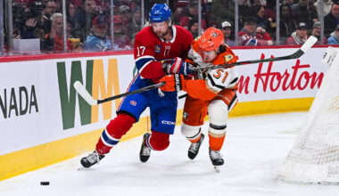 Mar 15, 2026; Montreal, Quebec, CAN; Montreal Canadiens right wing Josh Anderson (17) battles for the puck with Anaheim Ducks defenseman Olen Zellweger (51) during the first period at Bell Centre. Mandatory Credit: David Kirouac-Imagn Images