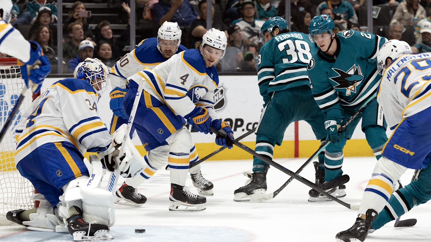 Mar 19, 2026; San Jose, California, USA; Buffalo Sabres goaltender Alex Lyon (34) blocks a shot on goal by San Jose Sharks center Will Smith (2) during the second period at SAP Center at San Jose. Mandatory Credit: D. Ross Cameron-Imagn Images