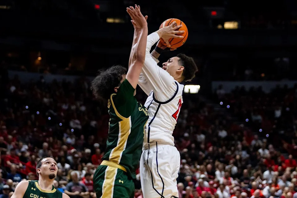 San Diego Aztecs guard Miles Byrd (21) goes for a contested lay-up during a Mountain West Championship tournament quarterfinal game between the San Diego Aztecs and the Colorado State Rams, Thursday March 12, 2026 in Las Vegas, Nev.