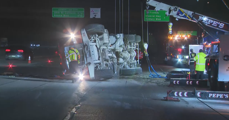 Several lanes on northbound 110 Freeway in Gardena closed after overturned cement truck