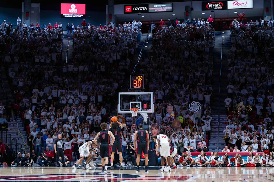 San Diego State fans attempt to distract UNLV forward Tyrin Jones (6) during an NCAA Basketball game between UNLV and San Diego State, Friday March 6, 2026 at Viejas Arena in San Diego, Calif.