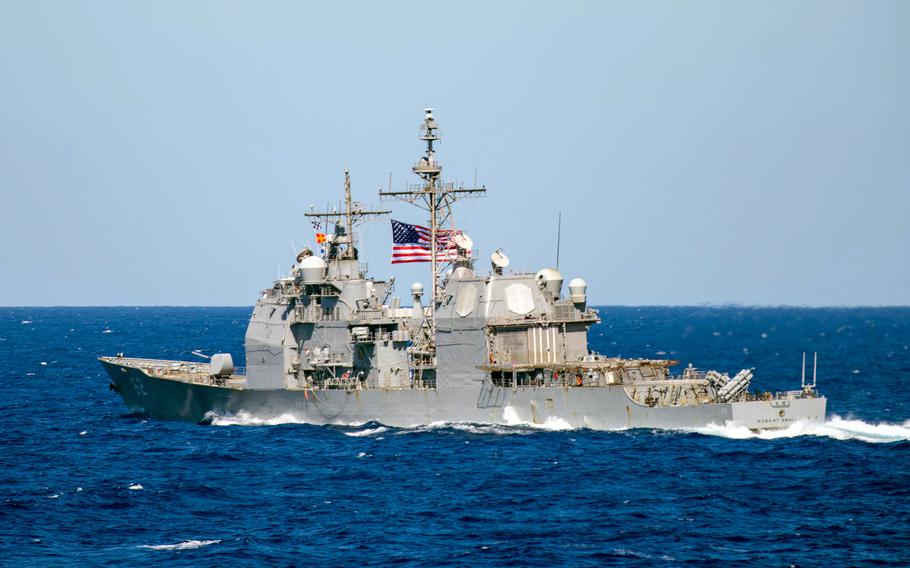 The guided-missile cruiser USS Robert Smalls transits the water.