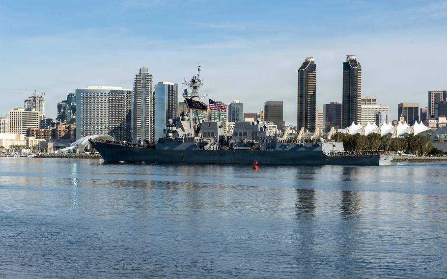 The guided-missile destroyer USS Mustin departs San Diego.