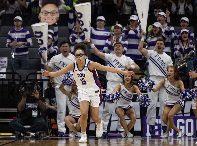 Texas Christian University Horned Frogs guard Olivia Miles celebrates after making a basket as she runs up court against the Virginia Cavaliers in an NCAA Women’s Basketball Tournament Sweet 16 game Saturday, March 28, 2026 at Golden 1 Center in Sacramento.