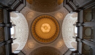 Dome ceiling with mosaic tiles at a court house in california.