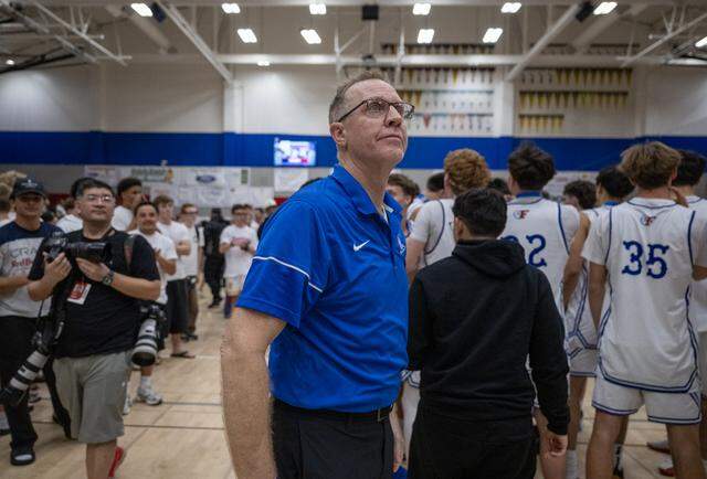 The Folsom Bulldogs coach Mike Wall looks up at the final score after the Bulldogs defeated the Kings Academy Knights in the CIF Northern California Regional Division I boys basketball championship on Tuesday, March 10, 2026, in Folsom.