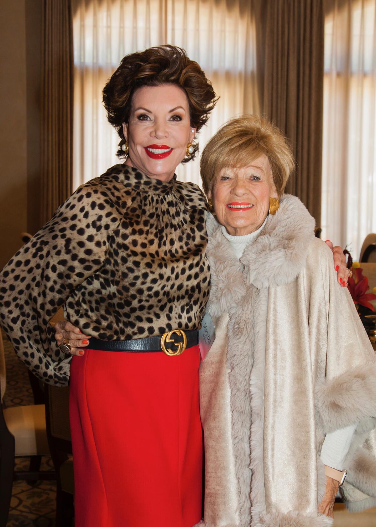 Adrienne Brandes and Mary Dell Barkouras pose together at the Film Scholars Luncheon held at Big Canyon Country Club.