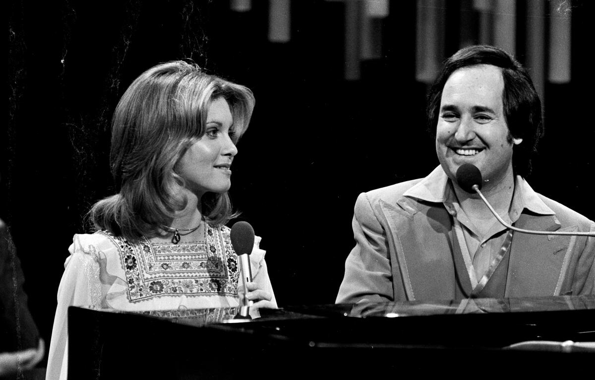 Olivia Newton-John and Neil Sedaka.