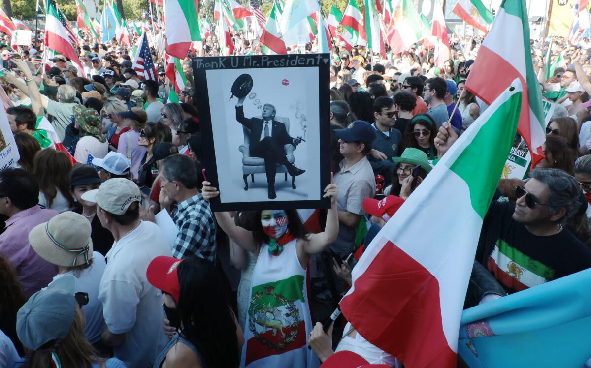 Thousands of demonstrators attend a rally chanting freedom for Iran at Federal Building.