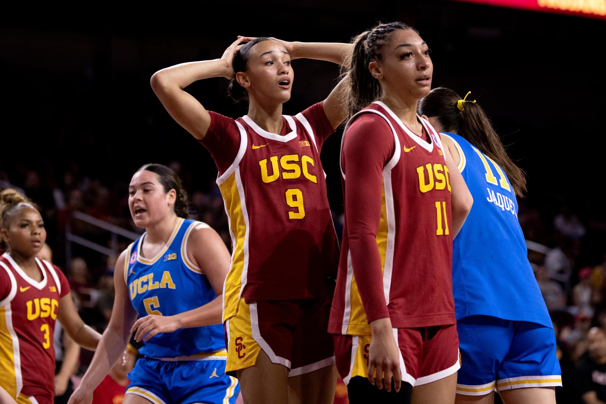 USC guard Jazzy Davidson (9) reacts to a call while standing next to guard Kennedy Smith.