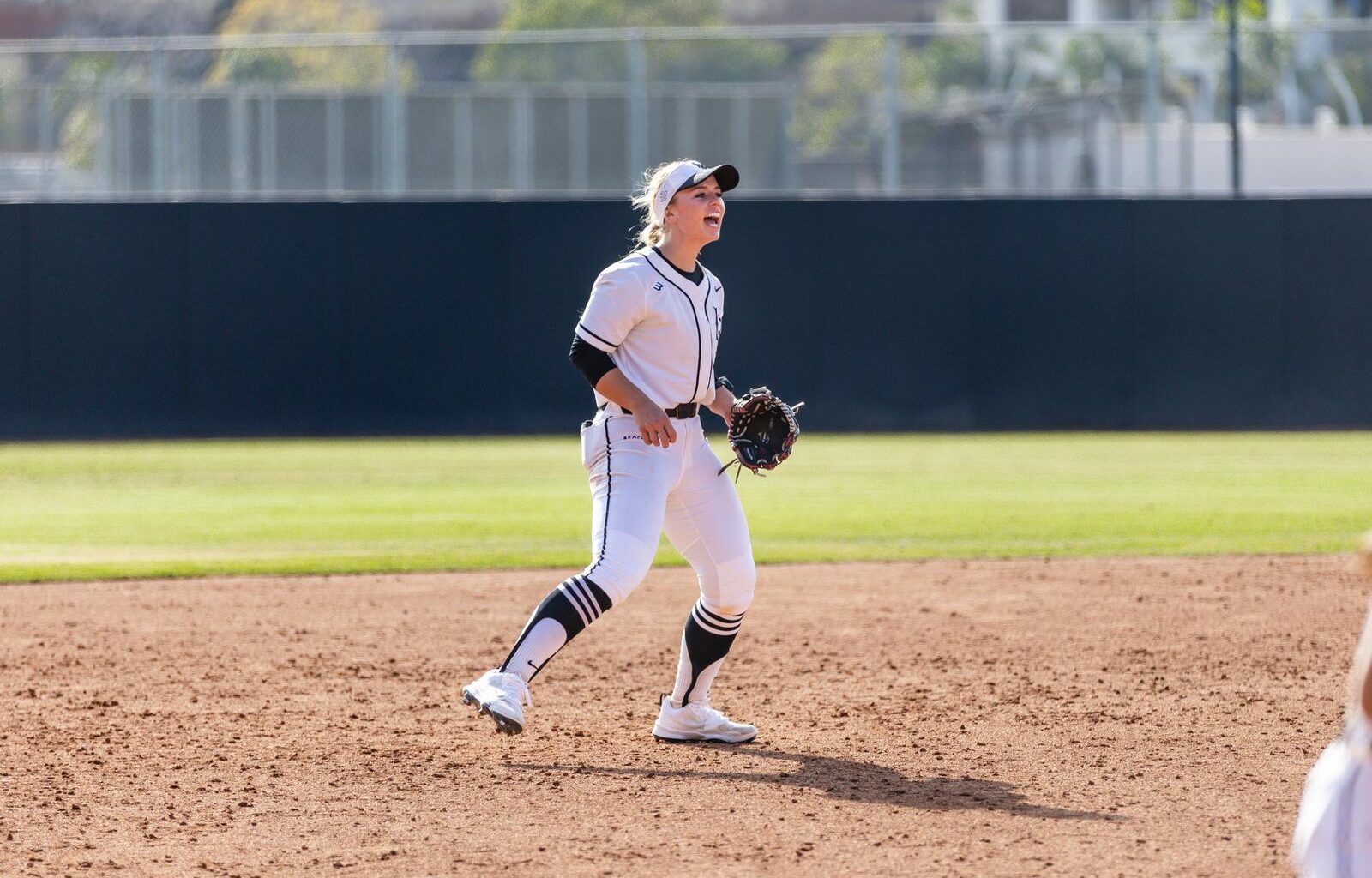 Arizona's Dominance: Wins 12-2 Against Long Beach State in Finale
