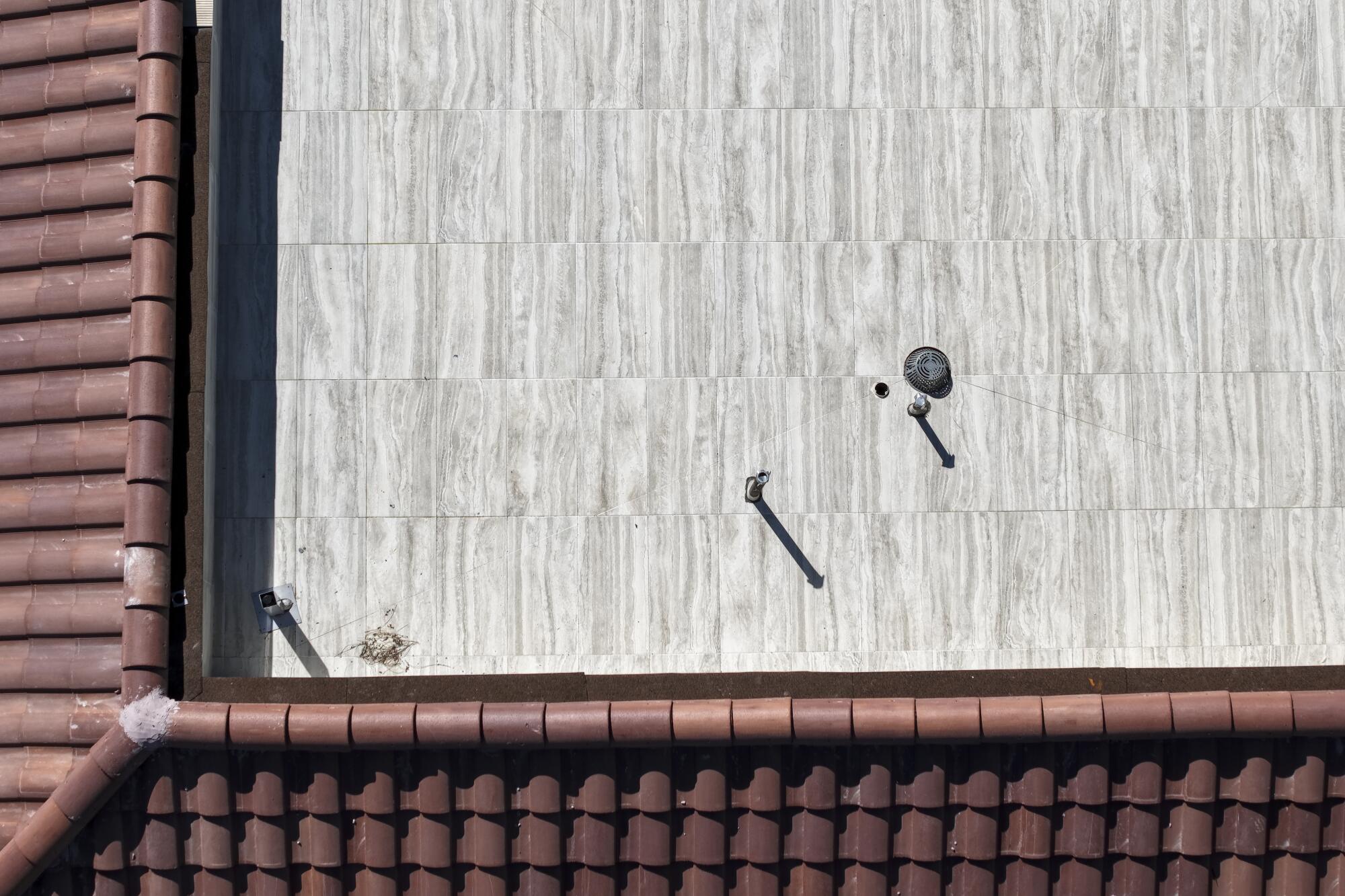 A sprinkler on a roof.