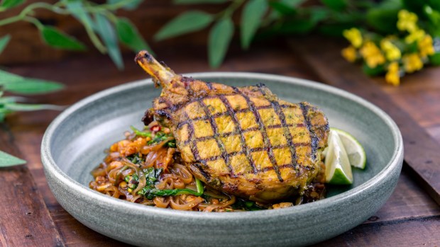 Chef's Special Thai-BBQ pork chop with drunken noodles available at the Disney California Adventure Food & Wine Festival. (Courtesy of Disneyland)