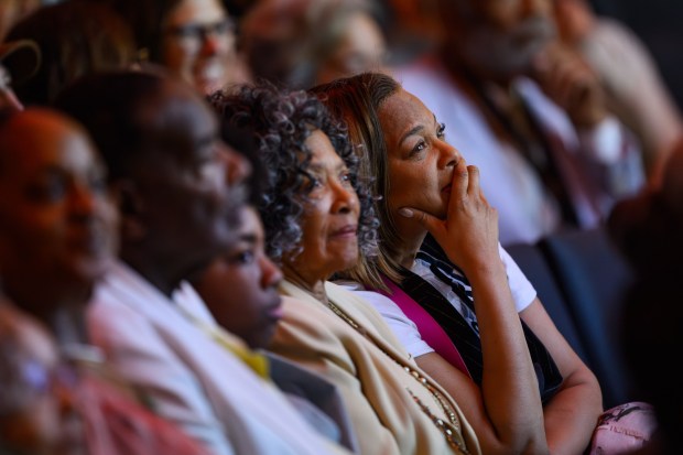 Attendees watch a photo slideshow during a public celebration honoring the life and legacy of Betty Reid Soskin held at Calvin Simmons Theatre in Oakland, Calif., on Sunday, March 1, 2026. Soskin passed away last year at the age of 104 and was known for being the oldest National Park Service ranger assigned to the Rosie the Riveter World War II Home Front National Historical Park in Richmond. (Jose Carlos Fajardo/Bay Area News Group)