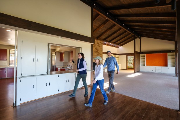 Senior transactions project manager Fiona Martin, left, media and communications senior manager Marti Tedesco, and Gordon Clark, president of the Peninsula Open Space Trust, a nonprofit environmental group based in Palo Alto, walk through the Mead Ranch house in Morgan Hill, Calif., on Friday, Feb. 27, 2026. The 1,921-acre property, located between San Jose and Morgan Hill and formerly owned by members of the Bechtel family, was sold to the nonprofit for $24.3 million. (Ray Chavez/Bay Area News Group)