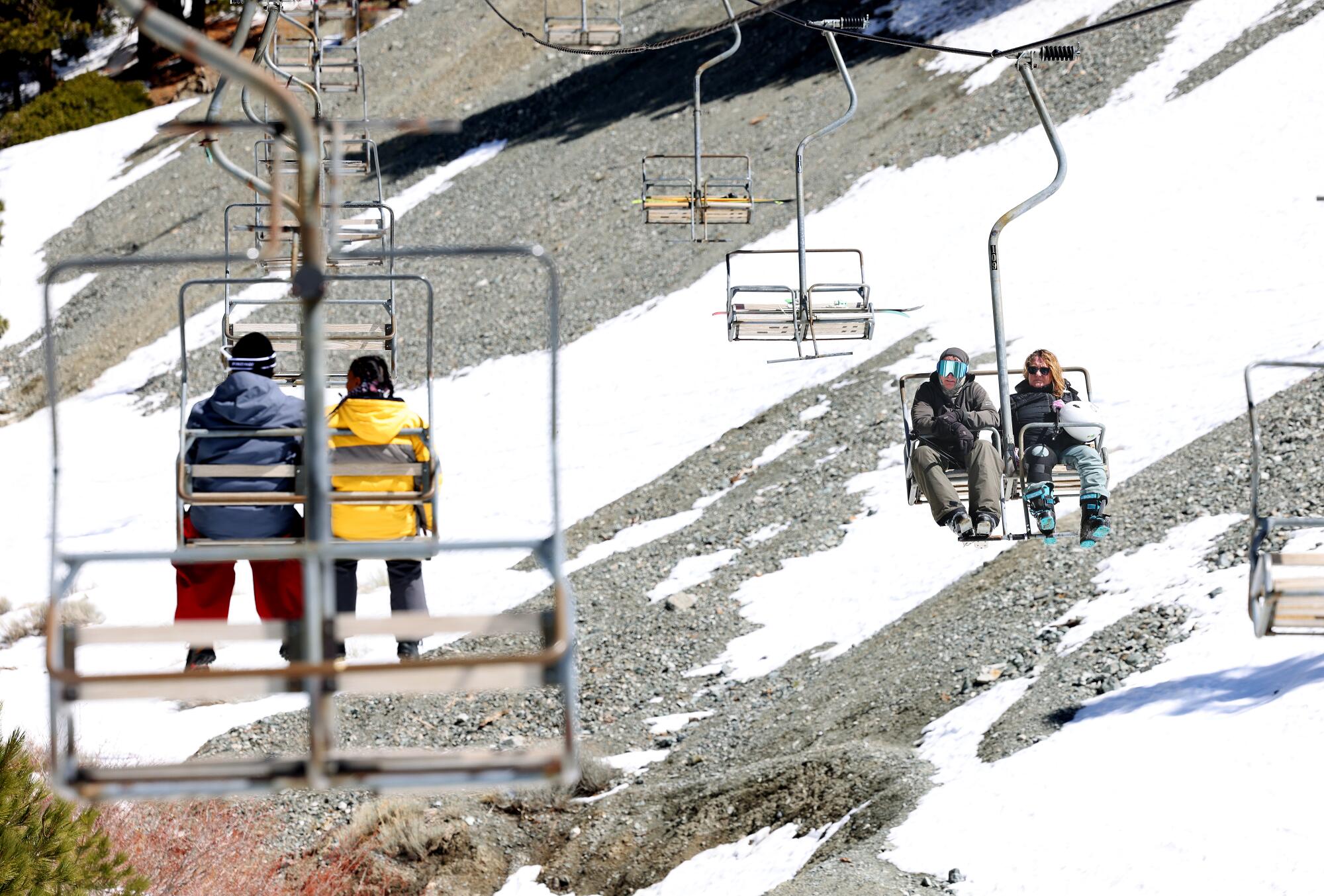 People make the up and down trip from the chairlift at Mt. Baldy.